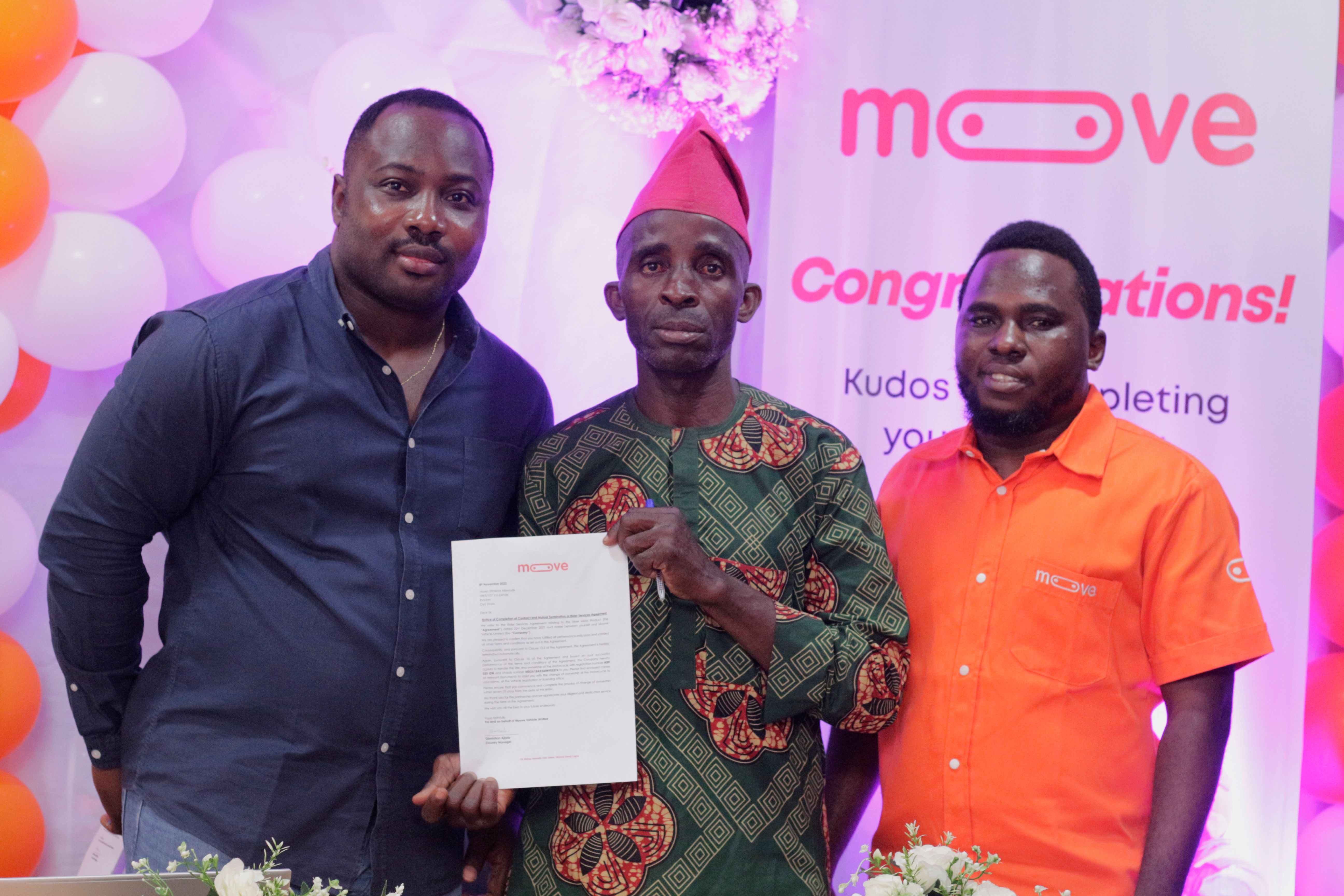 Moove Customers in Ibadan, Nigeria celebrating full ownership of their vehicles. L to R: Kelechi Eze, Legal Counsel for Moove, Moses Trimisiyu Alawode, Moove customer, and Gbolahan Ajijola, Mooves Country Manager for Nigeria.